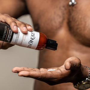 man pouring zenore moisturizing conditioner into hand