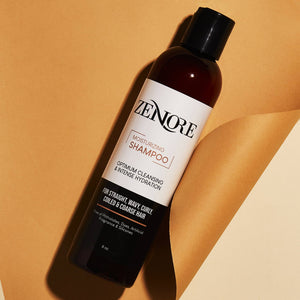 zenore moisturizing shampoo laying on background